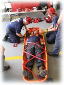 Two men undergoing rescue training
